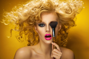 Portrait of a sexy woman with brush