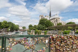 Love Padlocks At Bridge Over River Seine In Paris, France